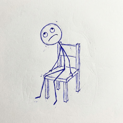 Hand-drawn stickman sitting on a chair